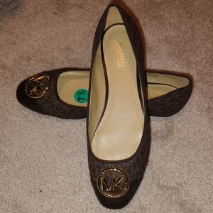 Michael Kors Brown Flats with Gold Logo. Never Used.